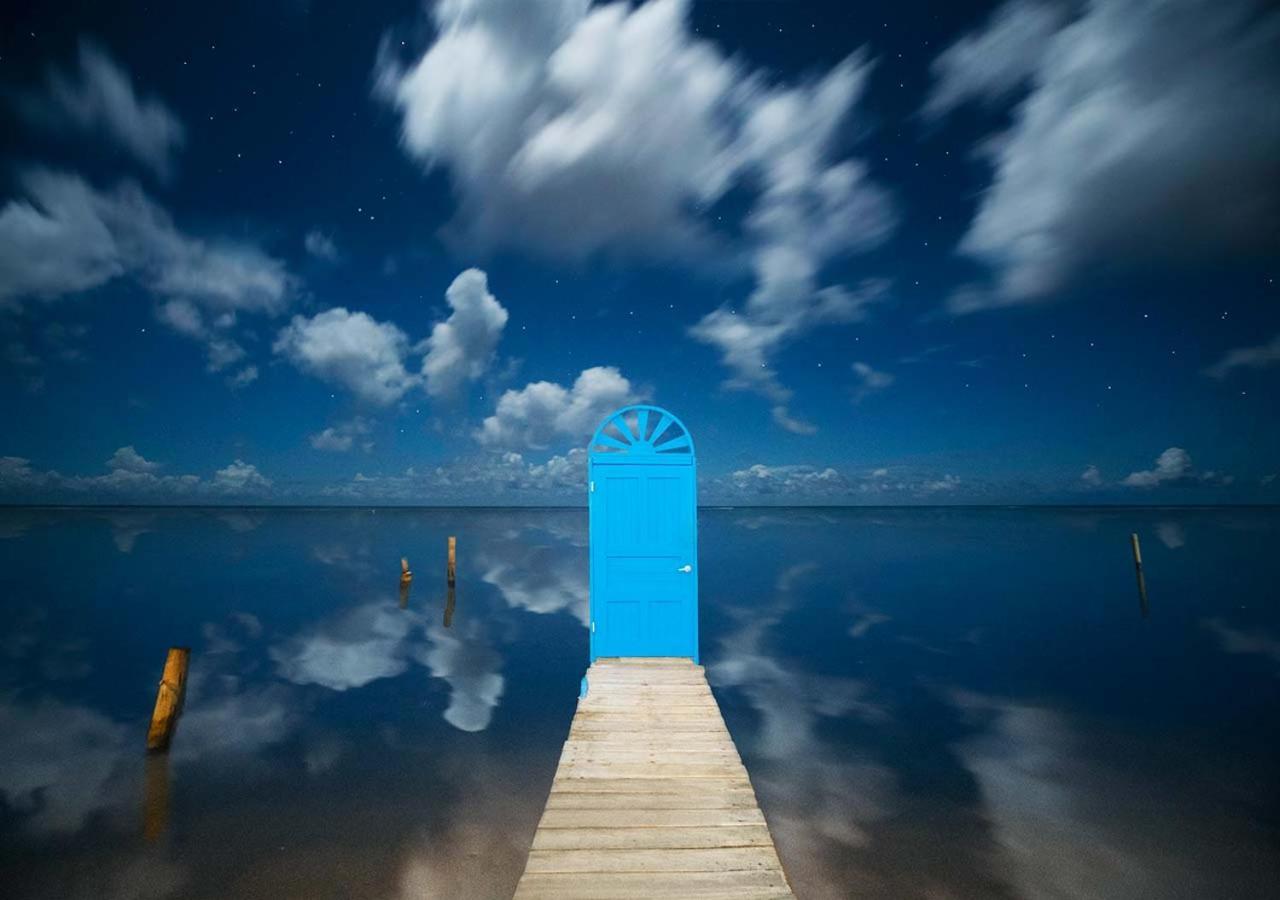 Puerta Azul Hotel Sandy Bay Buitenkant foto